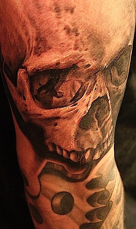 Skull with gears by Tony Adamson: TattooNOW