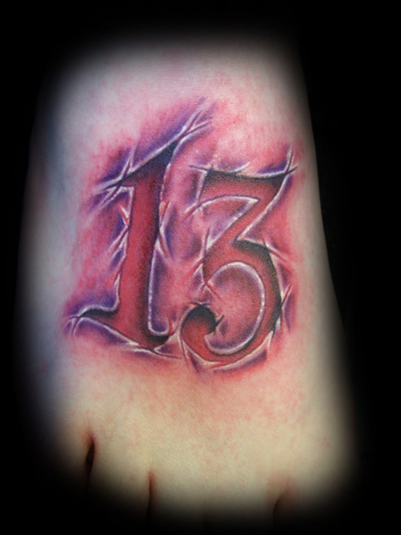 What Does 13 Tattoo Mean? | Represent Symbolism