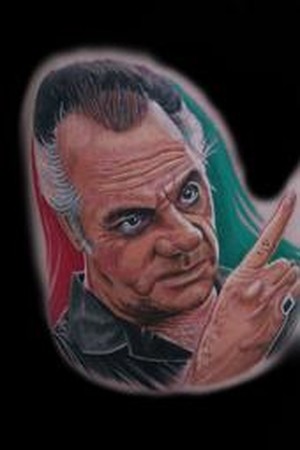 Is Robbie Williams new tattoo of his face real or not