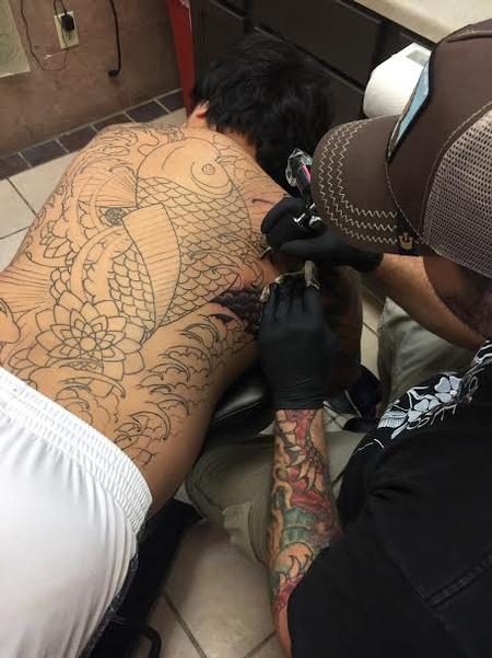 Chad Pelland - Chad working hard on this giant Koi back piece