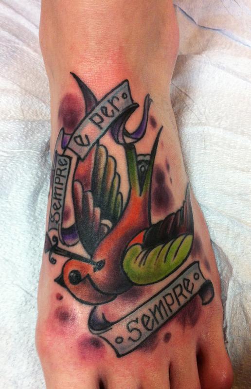 colorful traditional swallow foot tattoo by Mike Riedl - x: TattooNOW colorful traditional swallow foot tattoo by Mike Riedl - x: TattooNOW