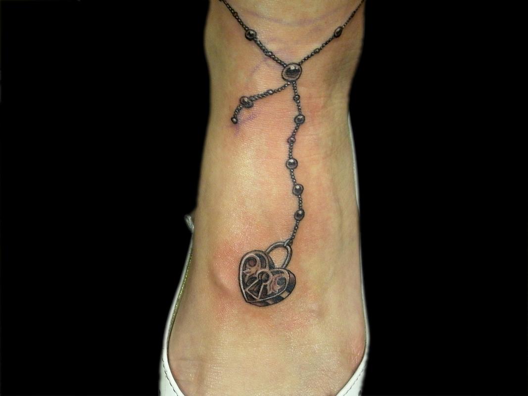 Heart locket/ ankle bracelet tattoo. by Ricky Clipz: TattooNOW