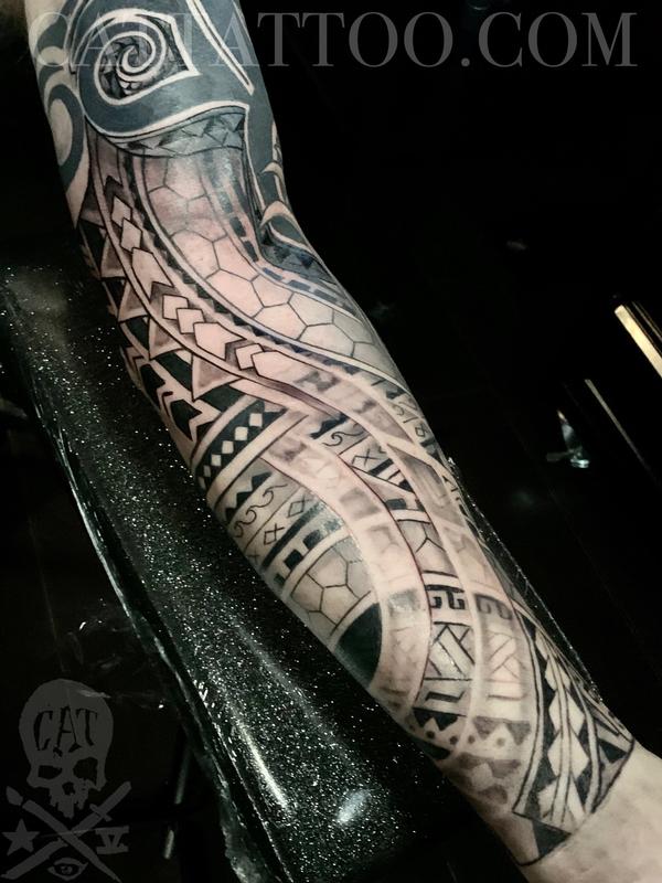 polynesian forearm tattoo