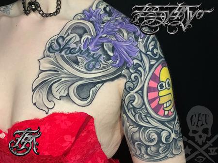 Terry Mayo - Black and grey filigree tattoo with script