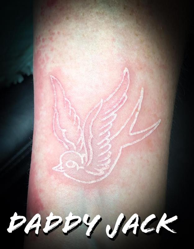 18 Beautifully Subtle White Ink Tattoo Ideas