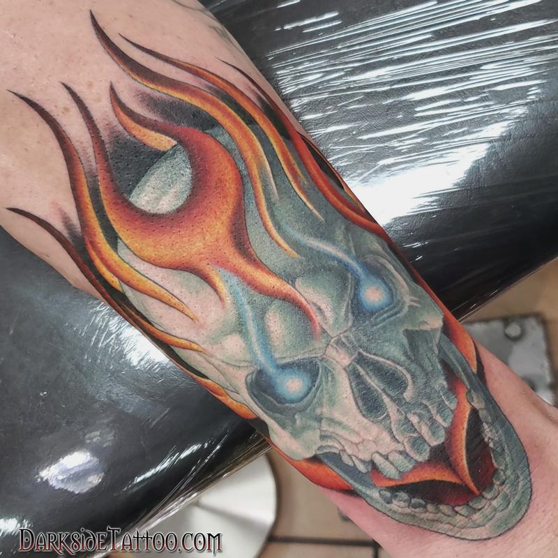 Skull and Crossbones with Snake and Fire Done at Lilium Tattoo HI  r tattoos