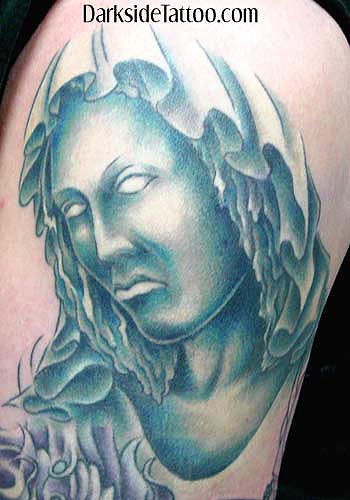 Sean O'Hara - Religious statue tattoo