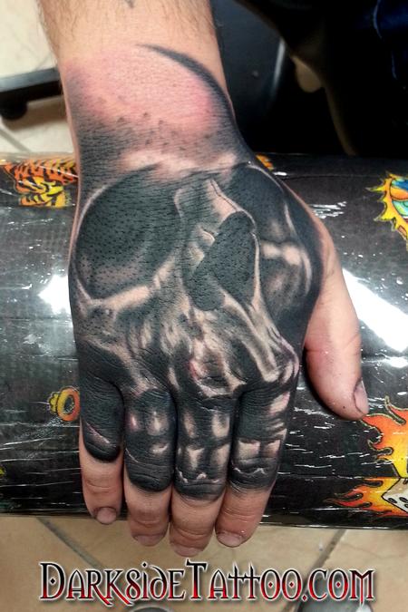 Tattoos - Black and Gray Skull on a Hand - 94482