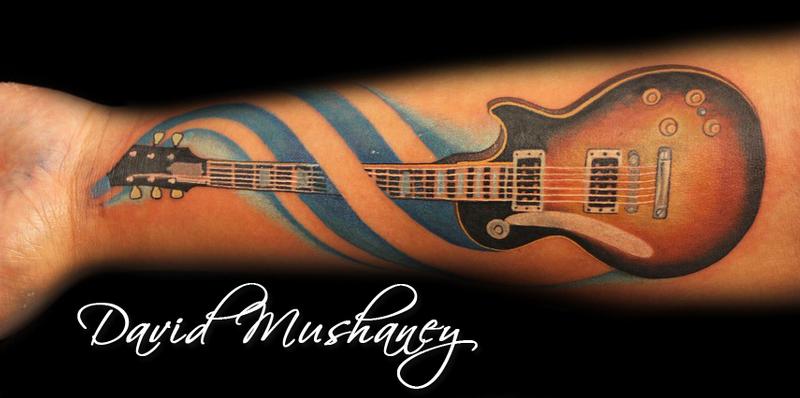 46 Elegant Guitar Tattoos For Back
