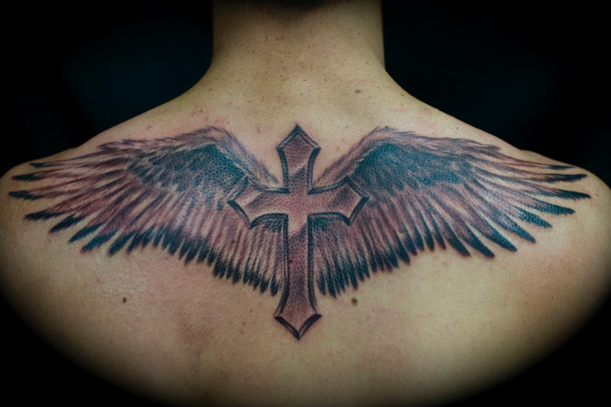 Top more than 66 cross and wings tattoo - thtantai2