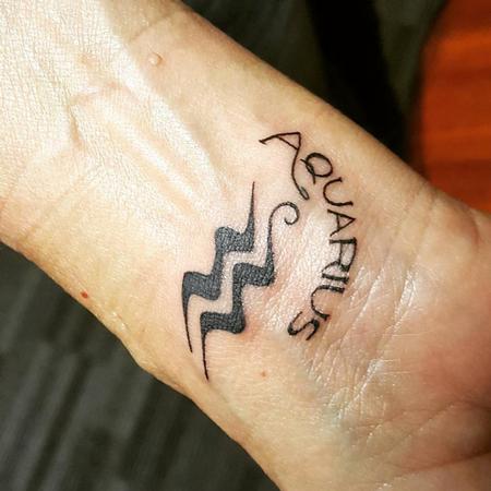 Stef aka Keki - Aquarius Wrist Tattoo