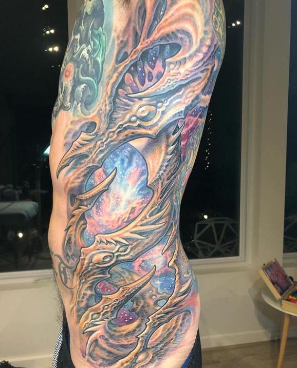 Guy Aitchison - Bio Space Rib Tattoo 