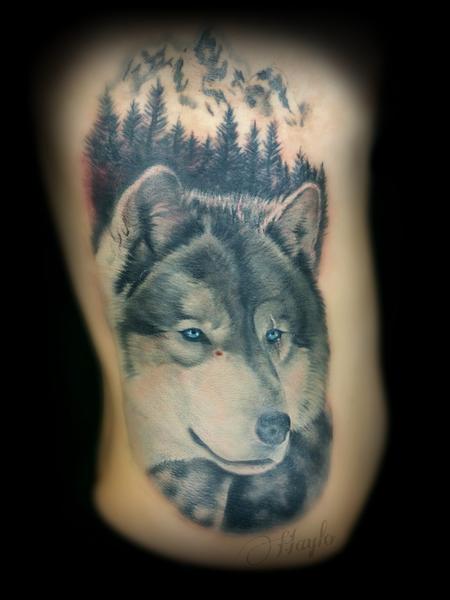 Haylo - Wolf and mountain scene tattoo in progress
