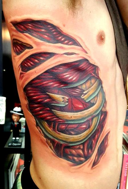 Tattoos - side rip tattoo - 129303