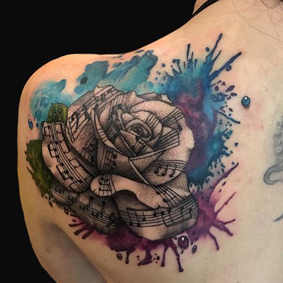 Roses and music notes tattoo by James Newson  Tribal Body Art