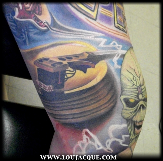 gold record by Lou Jacque: TattooNOW