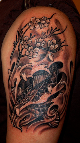 Beautiful thigh piece of two koi  Black Cannon Tattoos  Facebook
