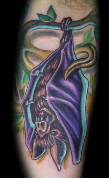 bat hanging upside down tattoo