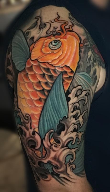 Koi fish tattoo by Phil Robertson: TattooNOW