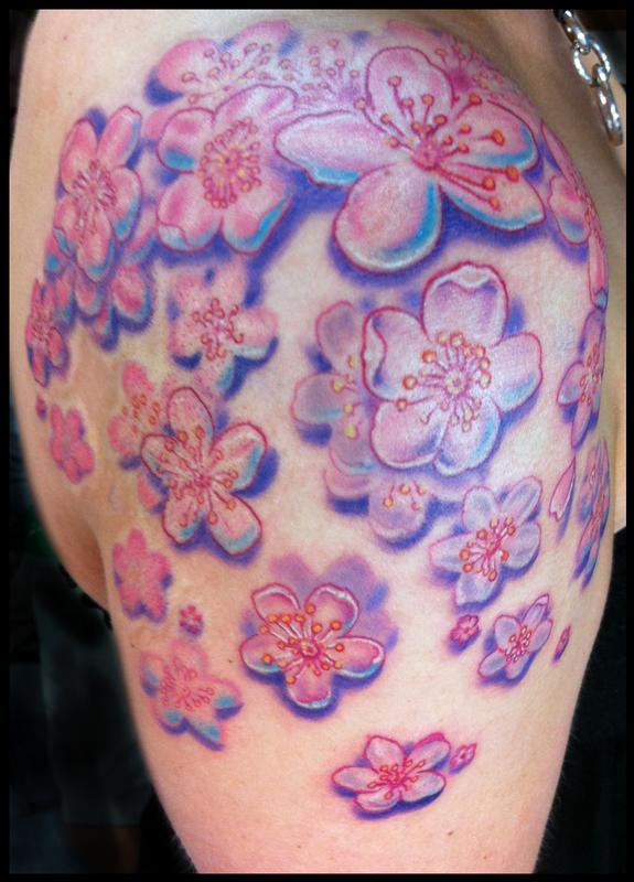 Cluster of cherry blossoms tattoo by Phil Robertson: TattooNOW