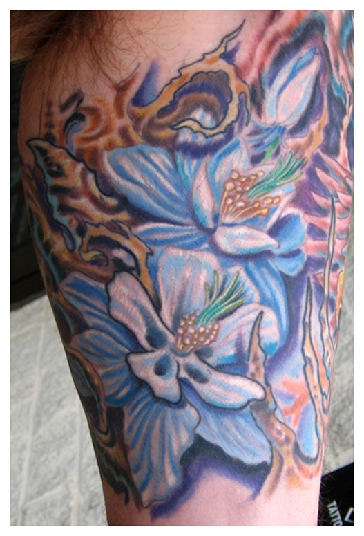 Realistic Purple Flower Tattoo by comotattoo  Tattoogridnet