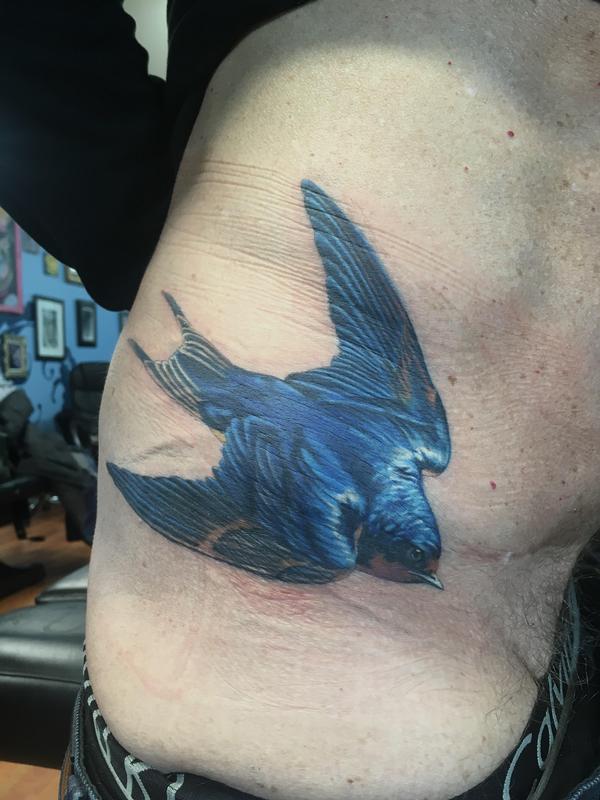 Realistic Blue Sparrow On Hip By Rafael Marte Tattoonow Realistic Blue Sparrow On Hip By Rafael Marte Tattoonow