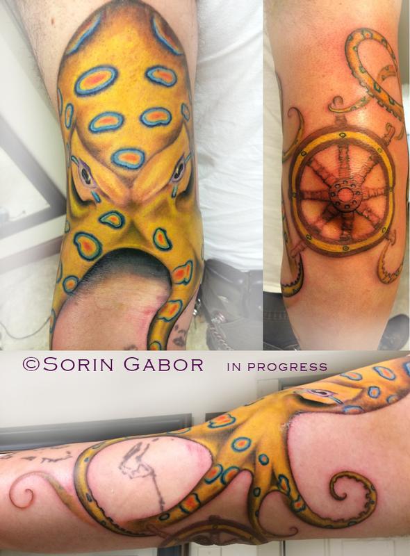 Realistic color blue ring octopus tattoo with ship wheel by Sorin Gabor: TattooNOW