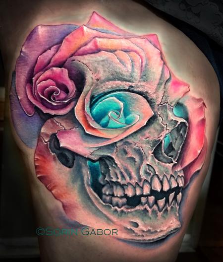 Sorin Gabor - realistic color skull and multiple rose morph tattoo