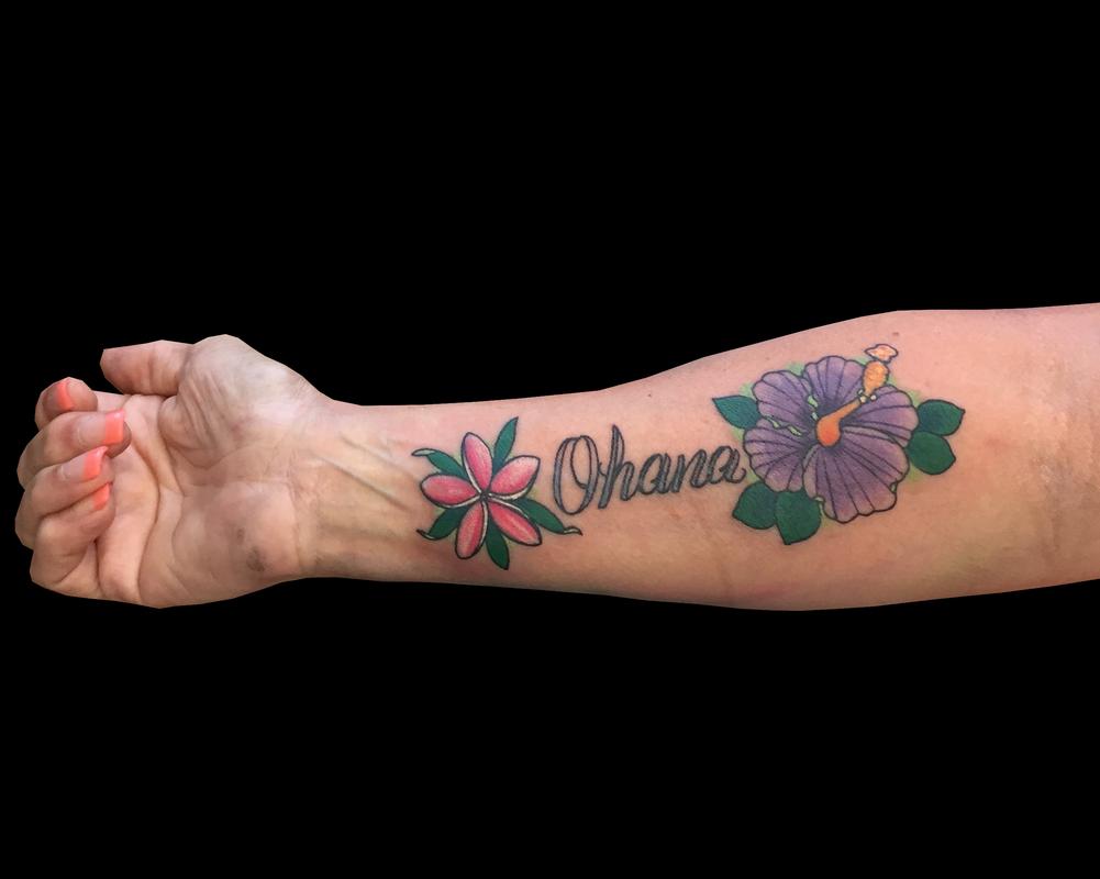 Hibiscus flower  Ohana tattoo on the inner forearm