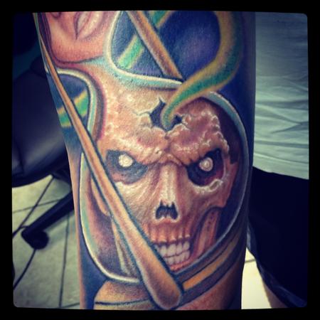 Stevie Monie - Skull in an hourglass tattoo close-up