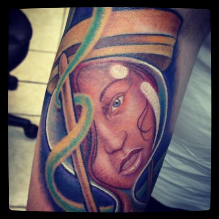 Stevie Monie - Girl in an hourglass tattoo close-up