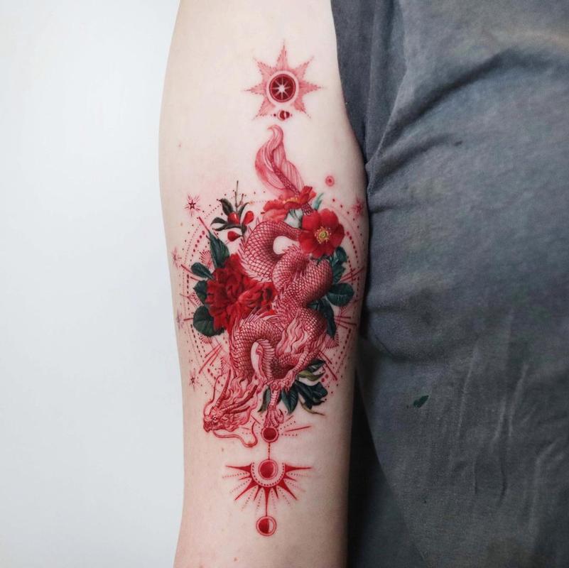 dragon and flower arm tattoo womanTikTok Search