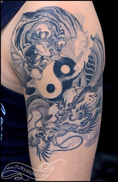 Black  White Dragon and Tiger Fighting Tattoo Design