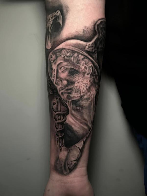 Statue Tattoo by Kevin Moore TattooNOW
