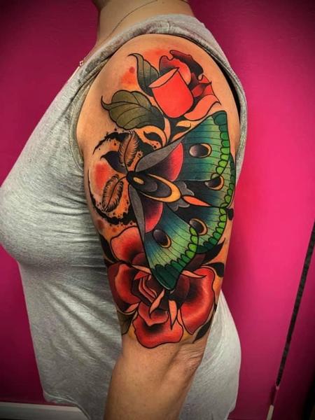 Moth with roses tattoo