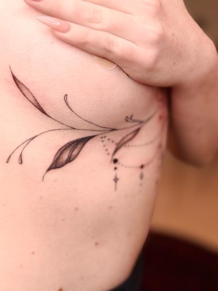 Ornamental filigree tattoo by Riley Muller at Unify Tattoo Company