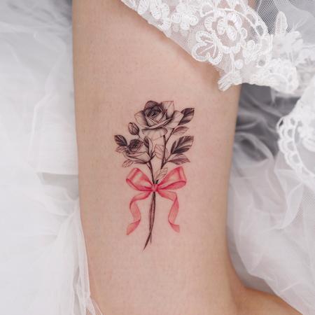 Tattoos - Flower with Ribbon on Thigh - 142948